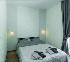 Четырёхместные апартаменты с 3 комнатами с балконом в Валентина