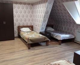 Кровать в 4-местном общем номере (мансарда) в Ласточкино Гнездо