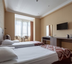 Стандартный двухместный номер с 1-й или  2-мя отдельными кроватями в Планета Спорт