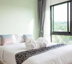 Двухместные апартаменты двуспальная кровать в Happy Place Condo