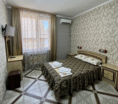 Стандарт с двухспальной кроватью в Симон