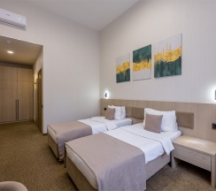 Двухместный номер «ДЕЛЮКС» с двумя отдельными кроватями в Riverside Hotel