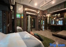 Вилла с 4 комнатами в KhgeMa NuanJun Pool Villa Gallery Resort