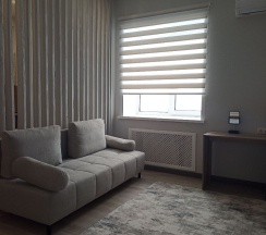 Студия (семейный) с одной двуспальной или двумя односпальными кроватями и диваном в Грэй