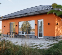 Двухместный коттедж с 3 комнатами с красивым видом из окна двуспальная кровать в Банный остров