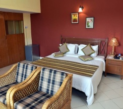 Двухместная вилла двуспальная кровать в Indismart Woodbourne Resort