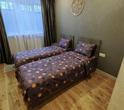 Кровать в 2-местном общем номере в Hotel Plaza+