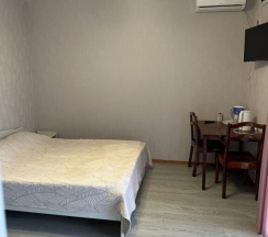 Трёхместный номер Comfort с красивым видом из окна в А.Л.А.С.