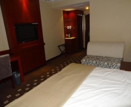 Номер Standard в Huilong Tower Hotel