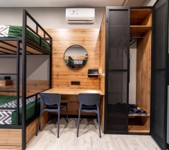 Кровать в общем мужском номере с 3 двухъярусными кроватями (общие удобства) в Сириус