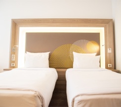 Номер Standard с двумя односпальными кроватями в Novotel Krasnoyarsk center