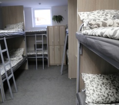 Спальное место на двухъярусной кровати в общем номере для мужчин в Okayhostel