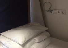 Кровать в 8-местном мужском номере №8 (удобства на этаже) в Hostel 65