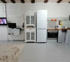 Двухместный коттедж с 4 комнатами с балконом двуспальная кровать в Уютный дом на Родине Деда Мороза