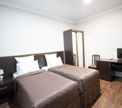 Номер стандарт с 2 односпальными кроватями в Таурух