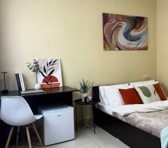 Номер стандарт комфорт с 1 двуспальной кроватью в Дисней