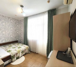 Номер стандарт с 1 двуспальной кроватью в Регион 86