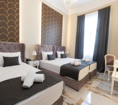 Трёхместный номер Deluxe в Modern Luxury Hotel