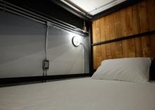 Кровать в общем номере в Sleepcase Hostel