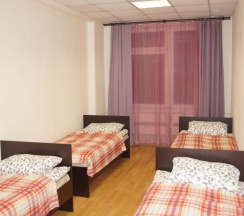 Кровать в общем номере в Натали