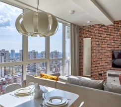 Двухместный люкс двуспальная кровать в Апартаменты Румер в современном жилом комплексе у ТЦ Дана Молл