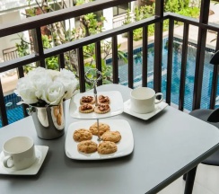Двухместный номер Luxury с балконом двуспальная кровать в The Title KR Beach Condotel Rawai Phuket
