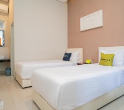 Двухместный номер Superior 2 отдельные кровати в Urbanview Hotel Bubusini Batu by RedDoorz