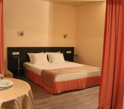 Номер люкс с 1 двуспальной кроватью в Триумф