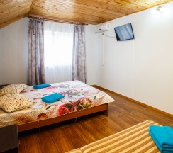 Трехместный номер с двуспальной и односпальной кроватями в Сочи Олимпийский парк Сириус