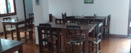 Кровать в общем номере в Hostal Tilian