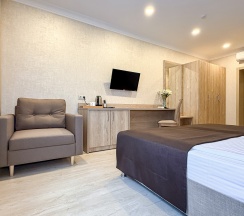 "Стандарт" Стандартный трехместный номер с 2 отдельными кроватями и дополнительным местом в Диона