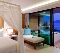 Двухместный люкс с видом на море двуспальная кровать в Отель Zenmaya Oceanfront Phuket, Trademark Collection by Wyndham
