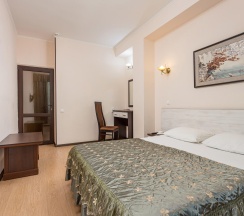 Номер улучшенный с 1 двуспальной кроватью (корпус В) в Русич