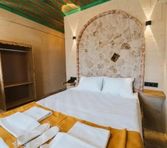 Двухместный люкс двуспальная кровать в La Casa Cave