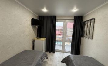 Двухместный номер 2 этаж Эконом двуспальная кровать в Ninel