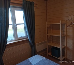 Коттедж с балконом и с красивым видом из окна в Гостевой дом