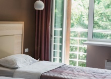 Номер стандарт улучшенный с 2 односпальными кроватями в Аврора парк отель