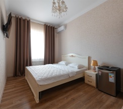 Комфортный улучшенный номер с двухспальной кроватью(King-size+) в Атмосфера
