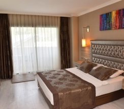 Номер для гостей с ограниченными возможностями в Green Nature Diamond Hotel