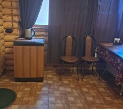 Дом двухместный из сруба и крымского песчаника в Подворье