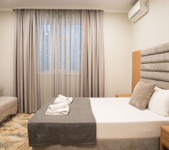 Делюкс в Акрополь