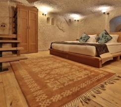 Двухместный люкс Cave Honeymoon двуспальная кровать в La Casa Cave