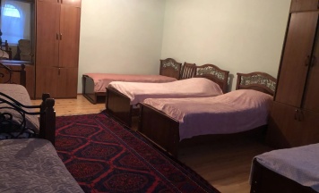 Кровать в общем номере (общая ванная комната) в Уют