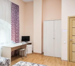 Кровать в 3-местном общем номере в Smart Hotel KDO Саранск