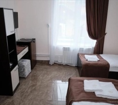 Трехместный номер с 3 односпальными кроватями в G-hotel