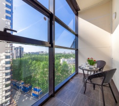 Улучшенная студия с кроватью king size и балконом в Pulkovo Apart