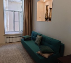 Двухкомнатная квартира с ванной,большой кроватью KING SIZE и кухонным уголком в На Невском