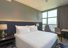 Люкс с 2 комнатами с видом на город двуспальная кровать в Chatrium Hotel Riverside Bangkok