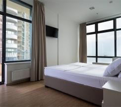 Семейные апартаменты с видом на море (4 этаж) в Real Apartments Sochi