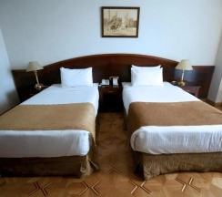 Семейный люкс в Triumph Plaza Hotel